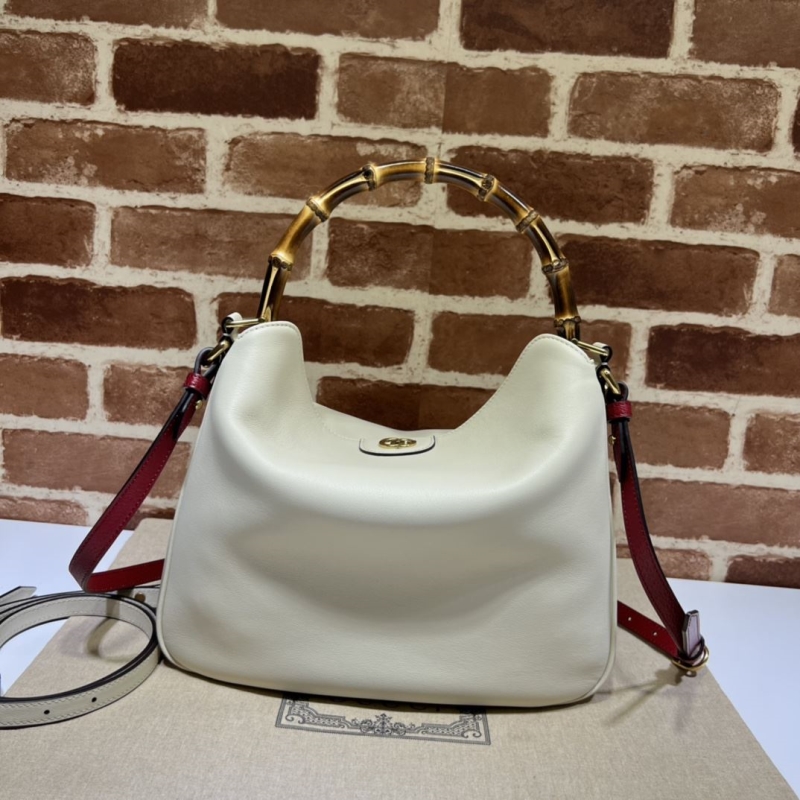 G*u*i top handle bags